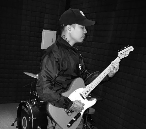 Photo of Ian Andanar, the owner of Caliz Skate Shop & Music Studio